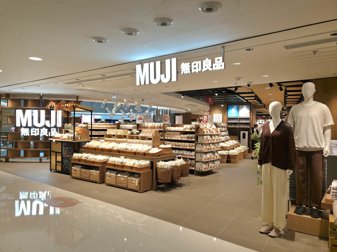 Bright retail store interior with shelves and checkout area