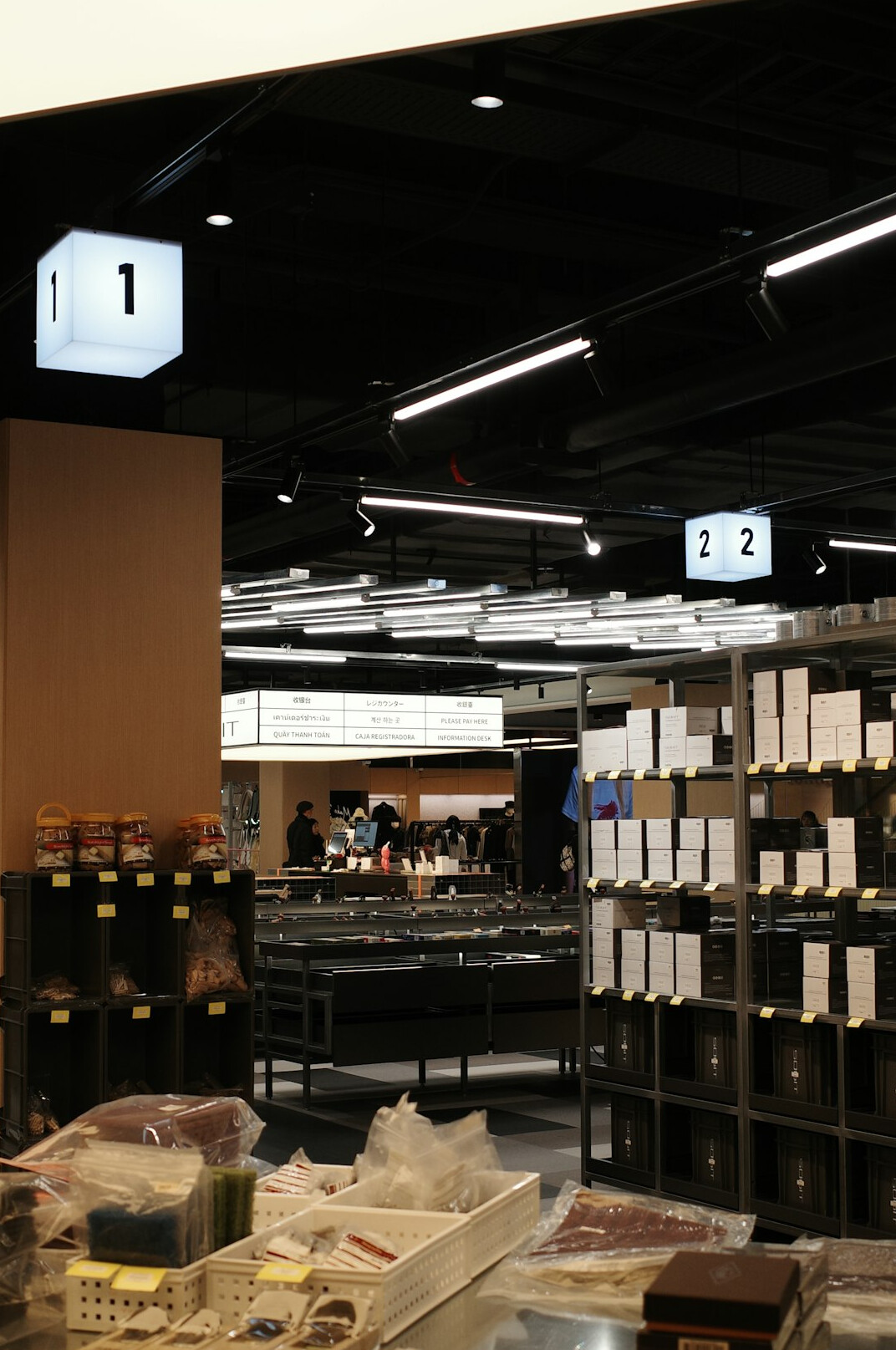 Supermarket aisle with fresh products and shopping area